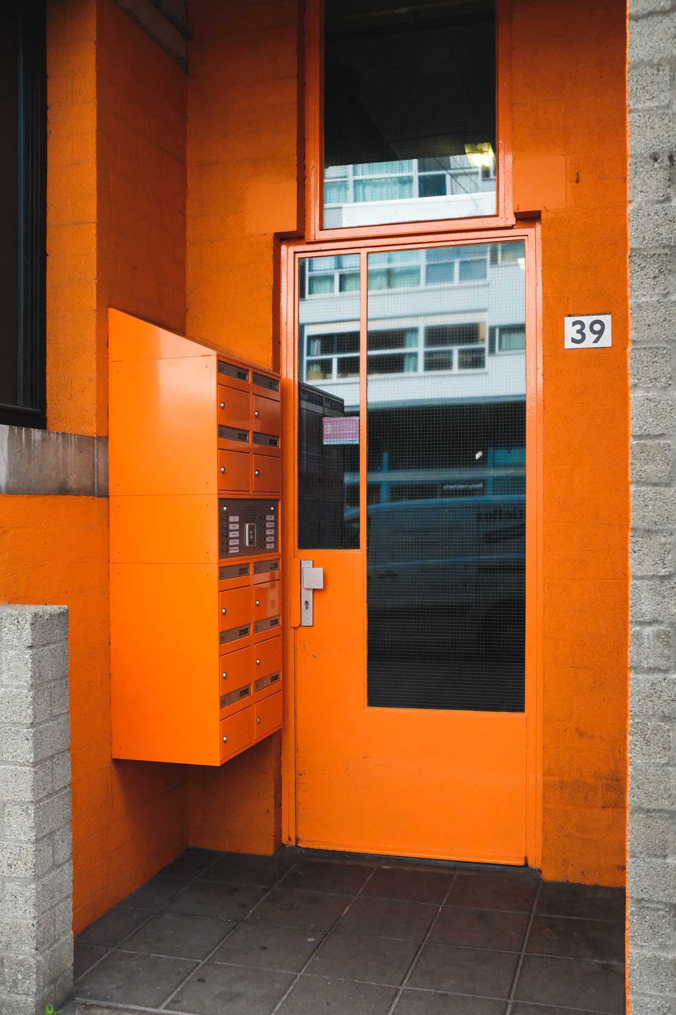 Orange door and mailbox