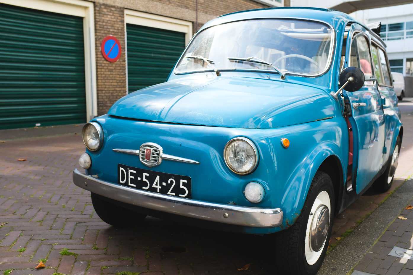 And old blue Fiat car